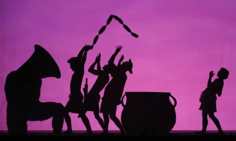 Members of the Pilobolus dance company perform a scene from their piece Shadowland during a press preview at Komische Oper in Berlin